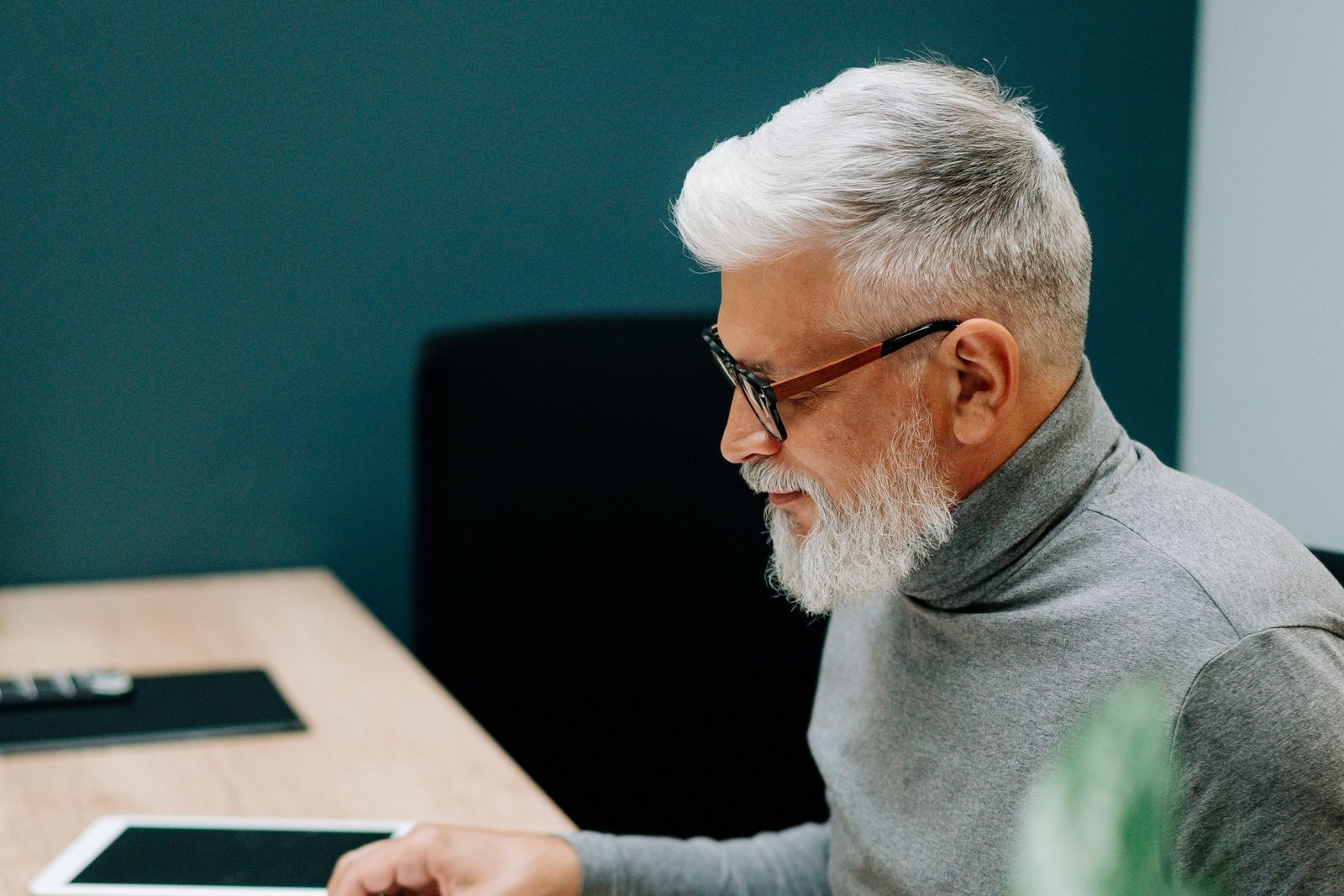 An adviser reading a client file